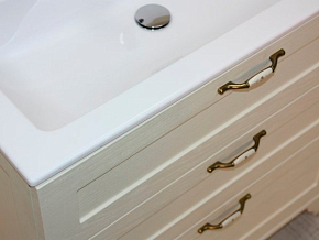 Фото Тумба под раковину Aquaton Леон 65Н дуб бежевый